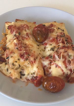 Una foto de Rollitos de pasta, rellenos de jamón cocido y ricota