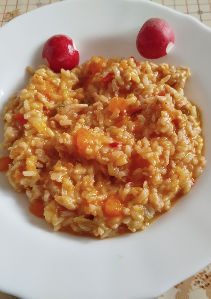Una foto de Arroz con carne picada de pollo