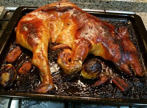 Una foto de Cochinillo al horno