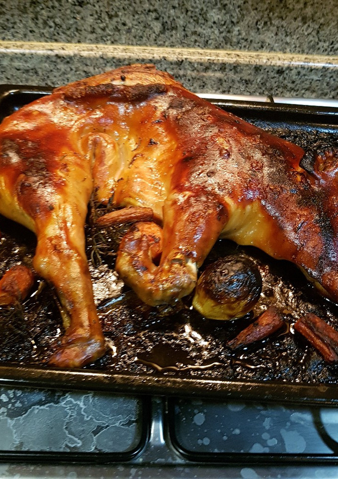 Una foto de Cochinillo al horno