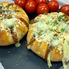A picture of Sandwiches with Cheese & Tomatoes.