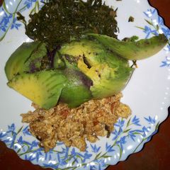 A picture of Fried Eggs, Kales with Avocado.
