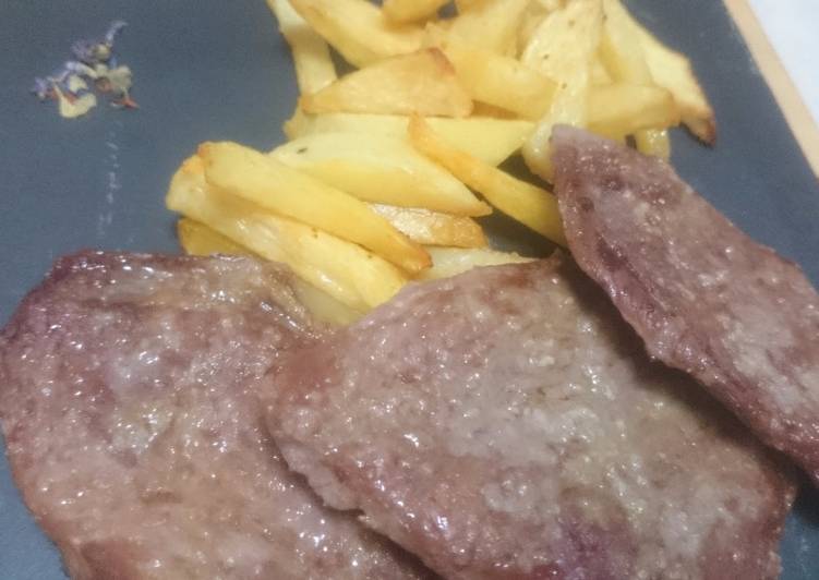 Patatas fritas y filetes de presa ibérica en freidora sin aceite de jocca