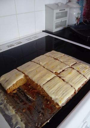 A picture of Carrot cake with cream cheese frosting.