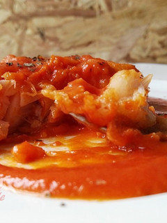 Una foto de Bacalao con tomate
