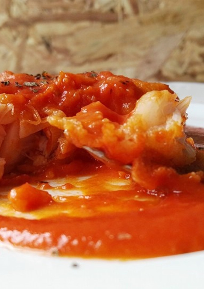 Una foto de Bacalao con tomate