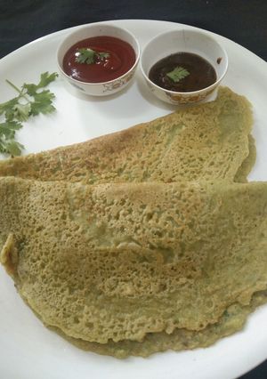 A picture of Moong dal and red lentil dosa.