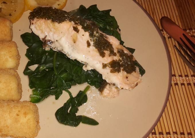 Simple citrus salmon on a bed of spinach w/ potatoes