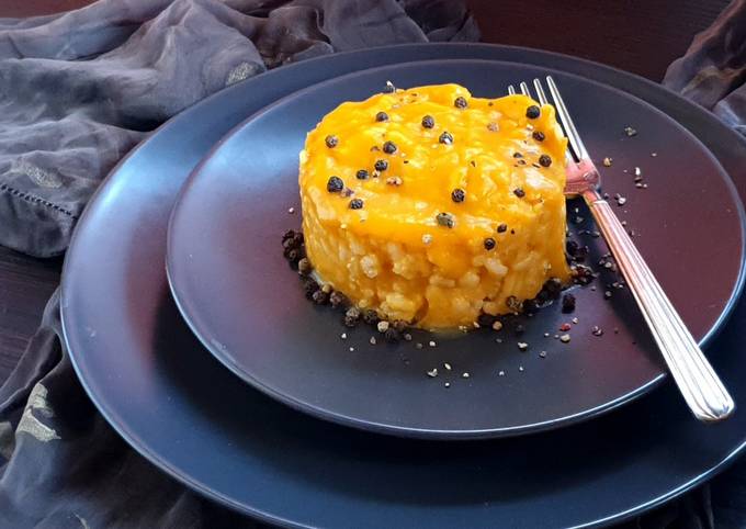 Passi a Preparare Qualsiasi notte della settimana Risotto alla zucca con grani di pepe