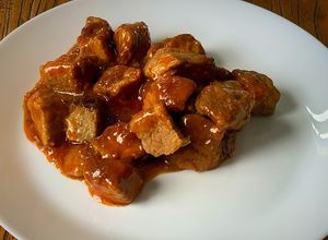 Una foto de Taquitos de cerdo en salsa