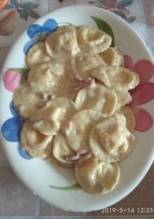 A picture of Ravioli with Speck and Gorgonzola.