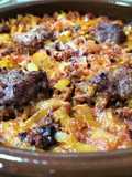 Arroz al horno con pelota y caldo de cocido