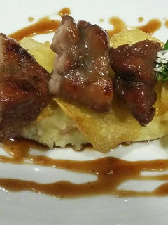 Una foto de Mollejas glaseadas con pastel de papas