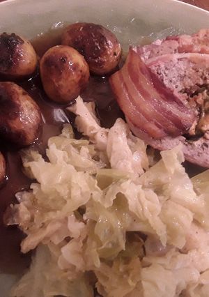 A picture of Sig's Cheese filled Meatloaf and wilted Cabbage.