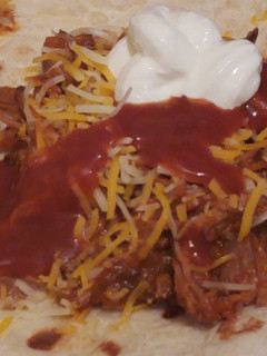 A picture of Pulled beef tacos.