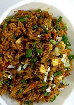 A picture of Schezwaan Paneer Fried Rice.