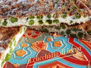 Una foto di frittata ai piselli