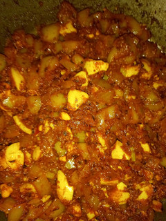 A picture of Boiled eggs in hungarian paprikash sauce.