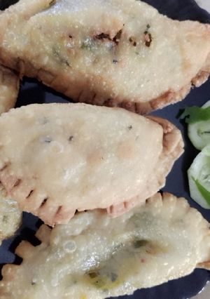 A picture of D shape samosa.