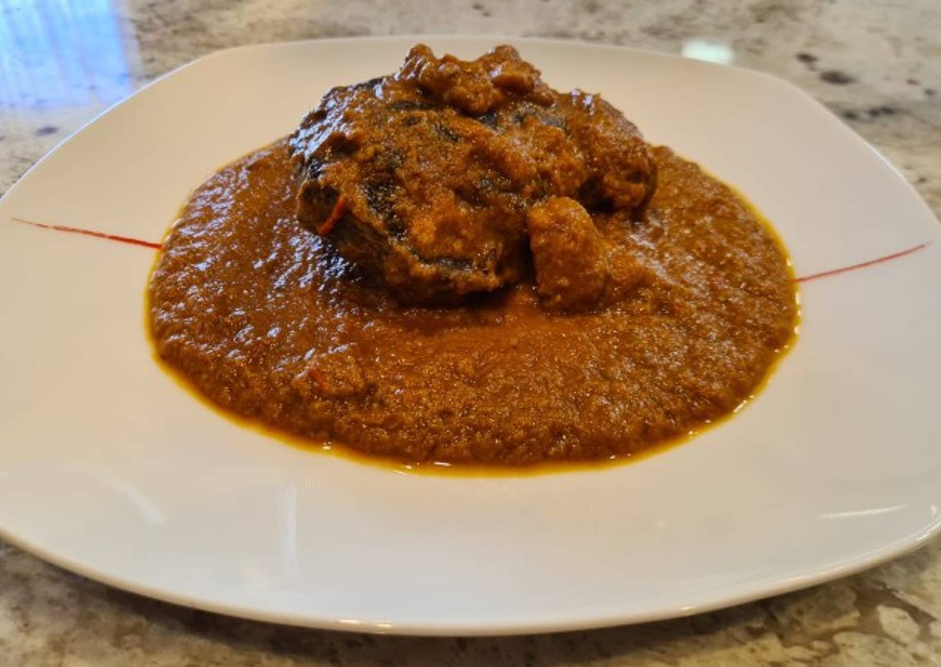 Carrilleras de ternera en salsa de nueces y curry