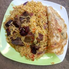 A picture of #kebbi made indomie and eggs.