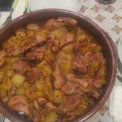 Una foto de Pollo con patatas ala coca cola