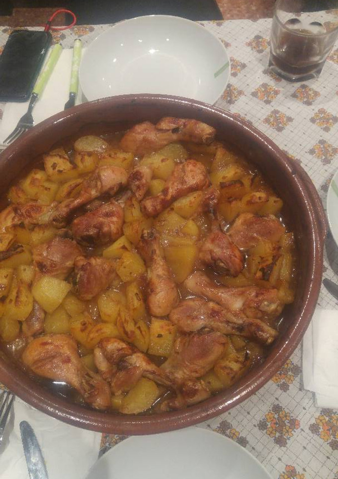 Una foto de Pollo con patatas ala coca cola