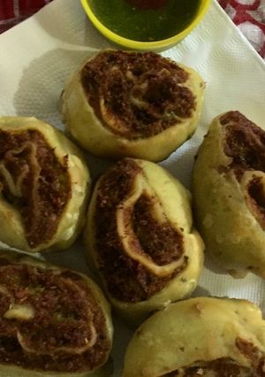 A picture of Bhakarwadi stuffed with peas.