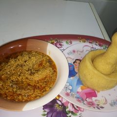 A picture of Turkey Meat Egusi Soup with Eba.