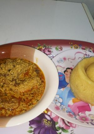 A picture of Turkey Meat Egusi Soup with Eba.