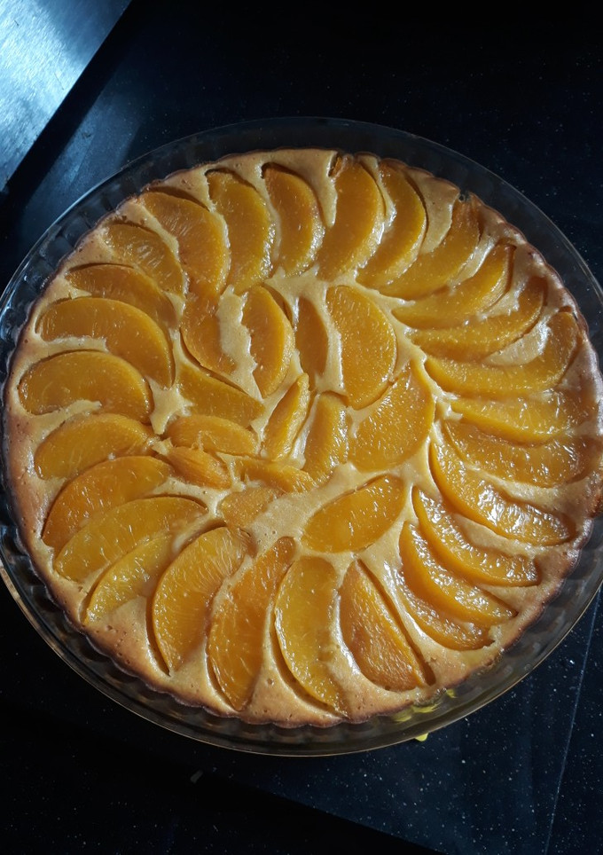 Una foto de Tarta de melocotón en almíbar