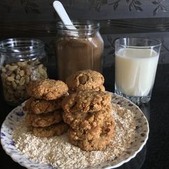 A picture of Oats Raisin cookies with coffee.
