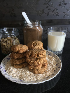 A picture of Oats Raisin cookies with coffee.