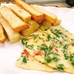 A picture of Vegetable omelette and fried yam.