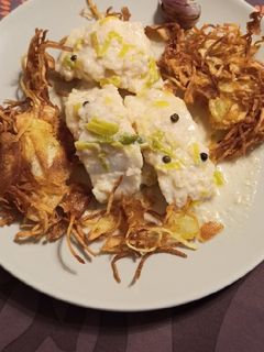 Una foto de Bacalao a la pimienta verde