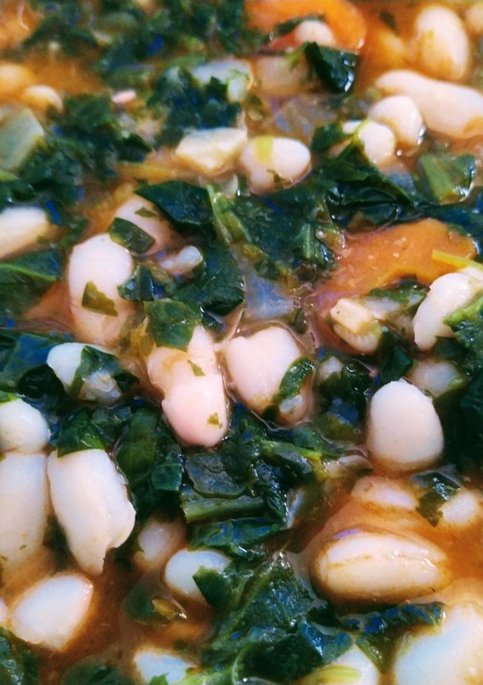 Una foto de Alubias blancas con espinacas