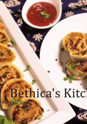A picture of Baked Paneer Pin Wheels.