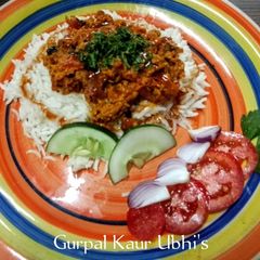 A picture of Masala scrambled eggs with cumin rice.