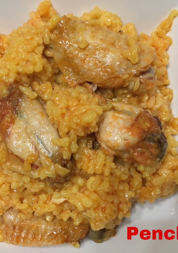 Una foto de Arroz de calasparra con alitas adobadas