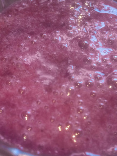 Una foto de Smoothie de uva y arándanos