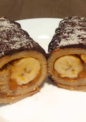 Una foto de Panqueque de banana y chocolate 🍌🍫