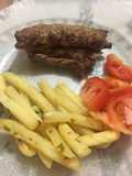 Pechito de cerdo con manta y papas al horno
