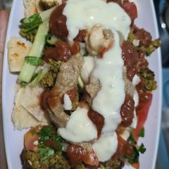 A picture of Falafel wrap / Mediterranean bowl / platter from the middle East.