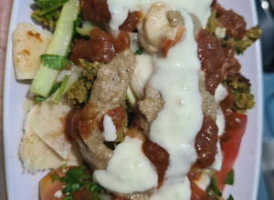A picture of Falafel wrap / Mediterranean bowl / platter from the middle East.