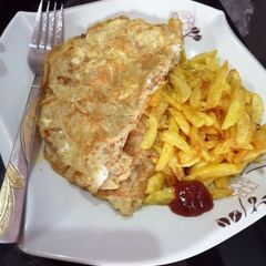 Fried potatoes and egg A picture of Fried potatoes and egg.
