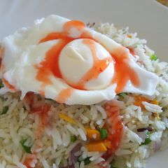 A picture of Breakfast Fried Rice Served with a Poached Egg#BreakfastContest.