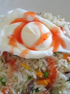 A picture of Breakfast Fried Rice Served with a Poached Egg#BreakfastContest.