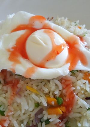 A picture of Breakfast Fried Rice Served with a Poached Egg#BreakfastContest.