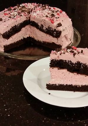 A picture of Chocolate Layer Cake with Cherry Cheesecake Filling and Frosting.
