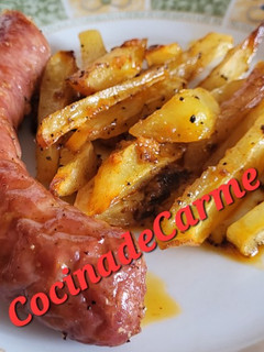 Una foto de Butifarra asada con patatas y sobrasada